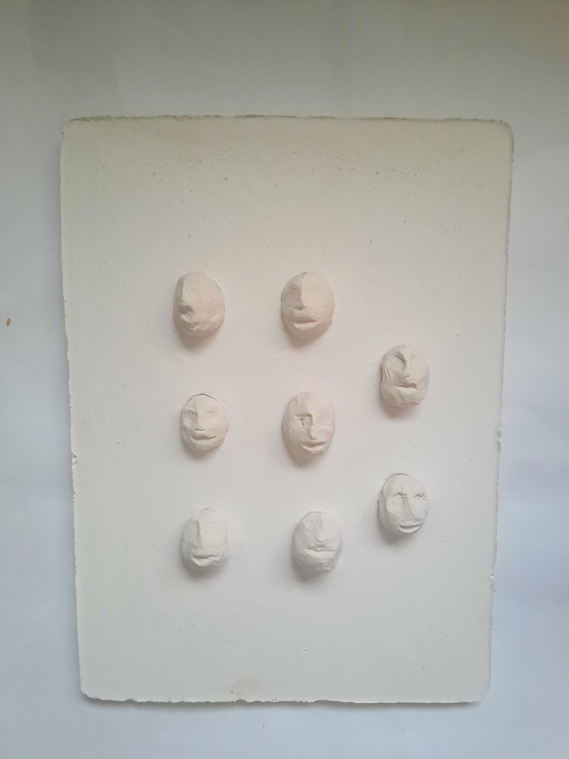 8 faces wall sculpture 26 cm x 36 cm